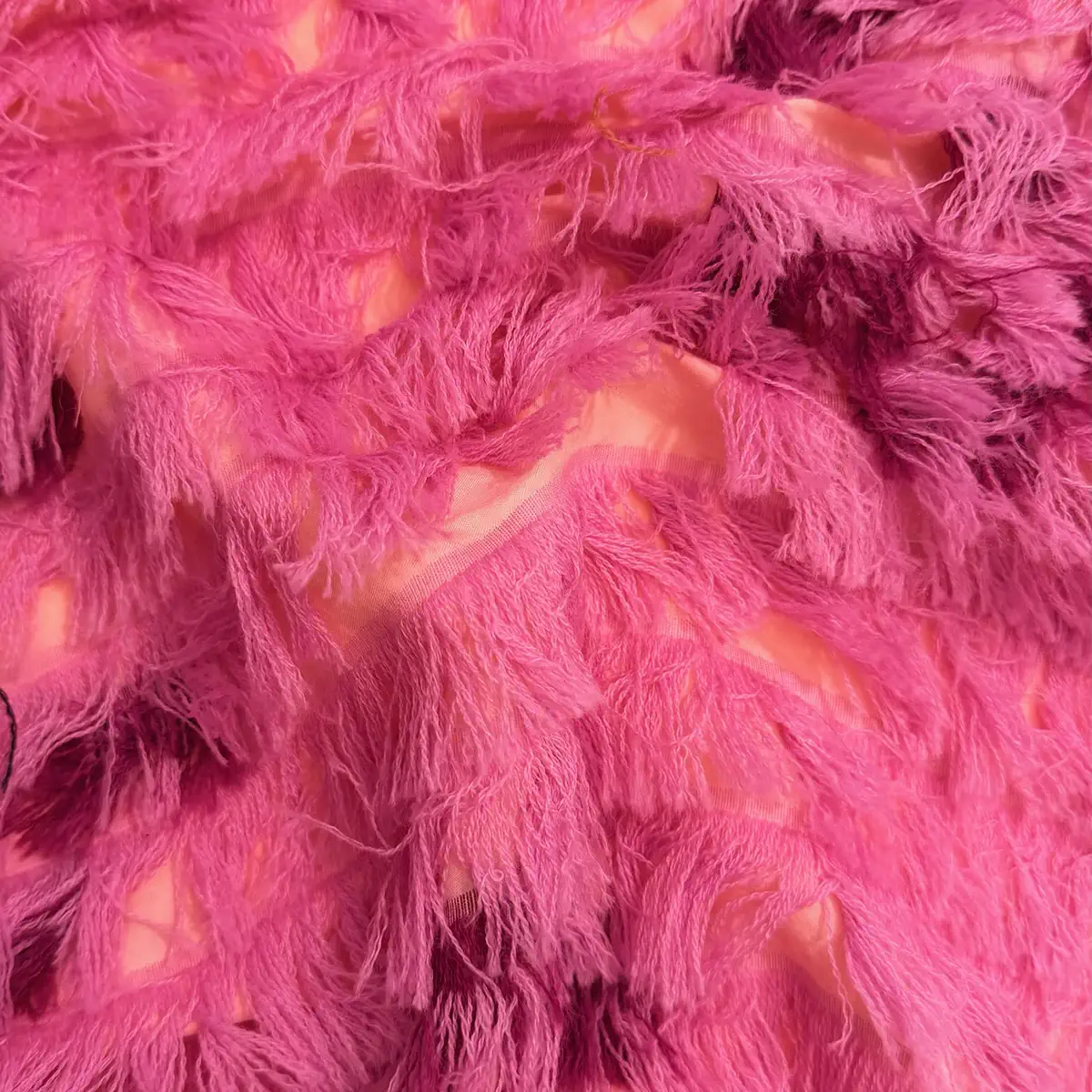 Fringed eyelash fabric in fuchsia